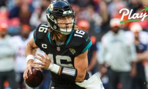 Jacksonville Jaguars quarterback Trevor Lawrence looks downfield.