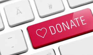A "donate" key on a computer keyboard