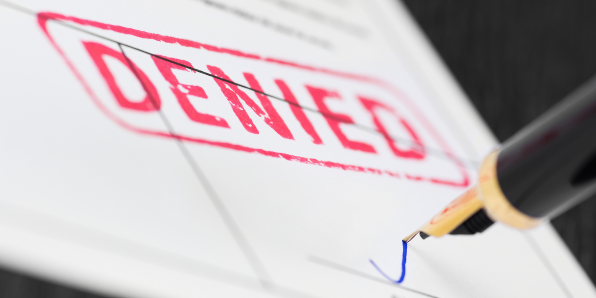A denial document getting signed